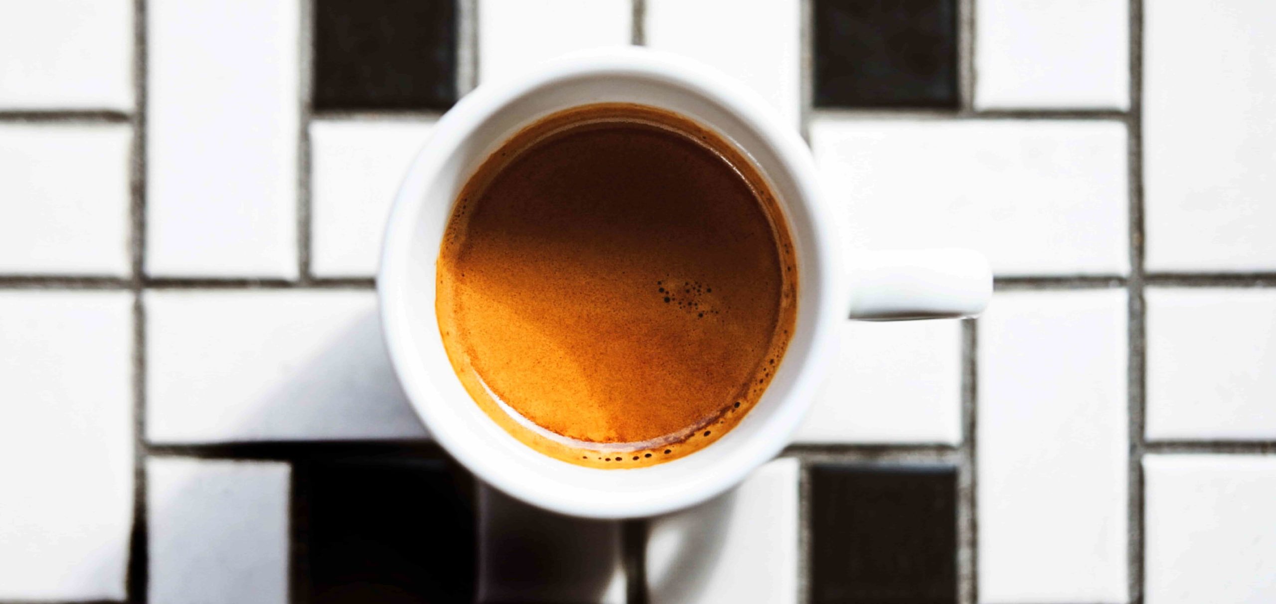 Specialty Coffee Espresso Shot On Top Of NYC Style Subway Tiles
